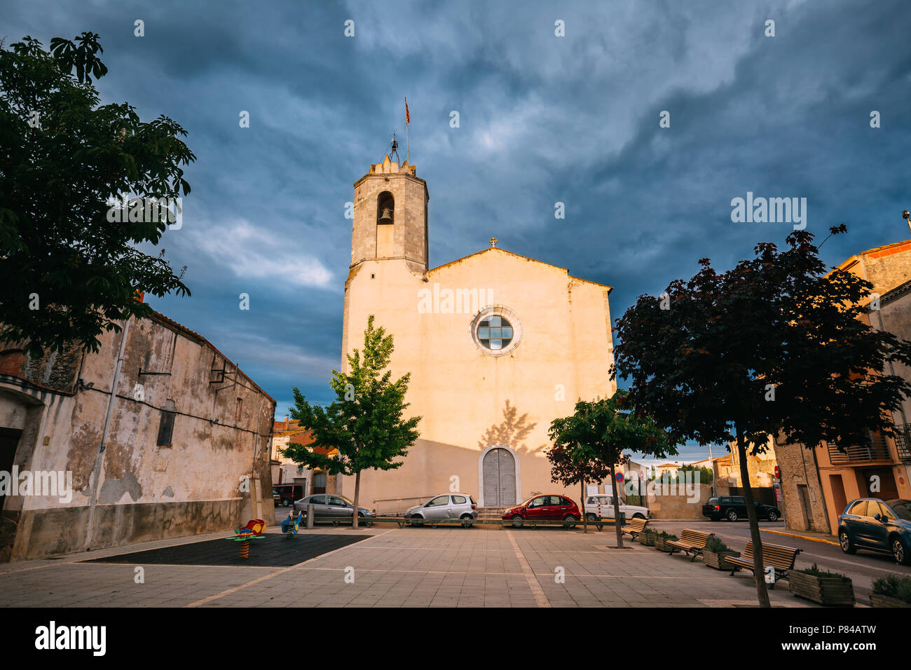 L'Armentera, Girona, Spain. The Church Of Our Lady Of Armentera In Sunny Summer Evening. Stock Photo