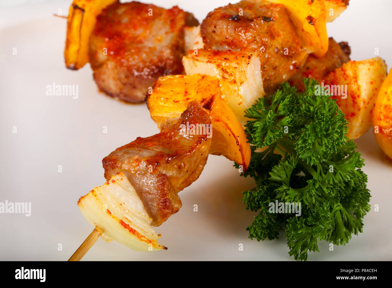 Pork skewers with vegetables Stock Photo Alamy