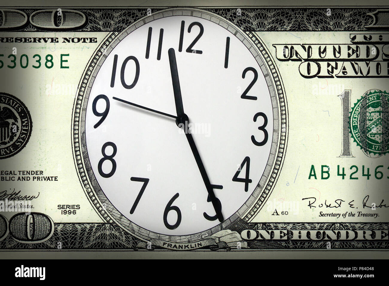 conceptual image of a clock on dollar bill background Stock Photo Alamy