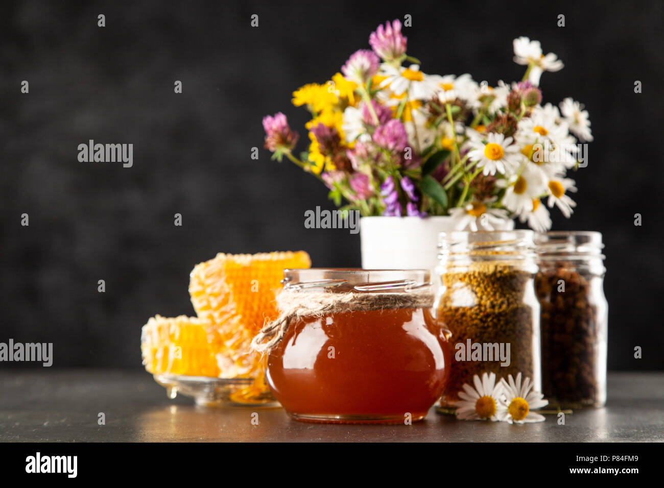 Honey jar and dipper Stock Photo Alamy