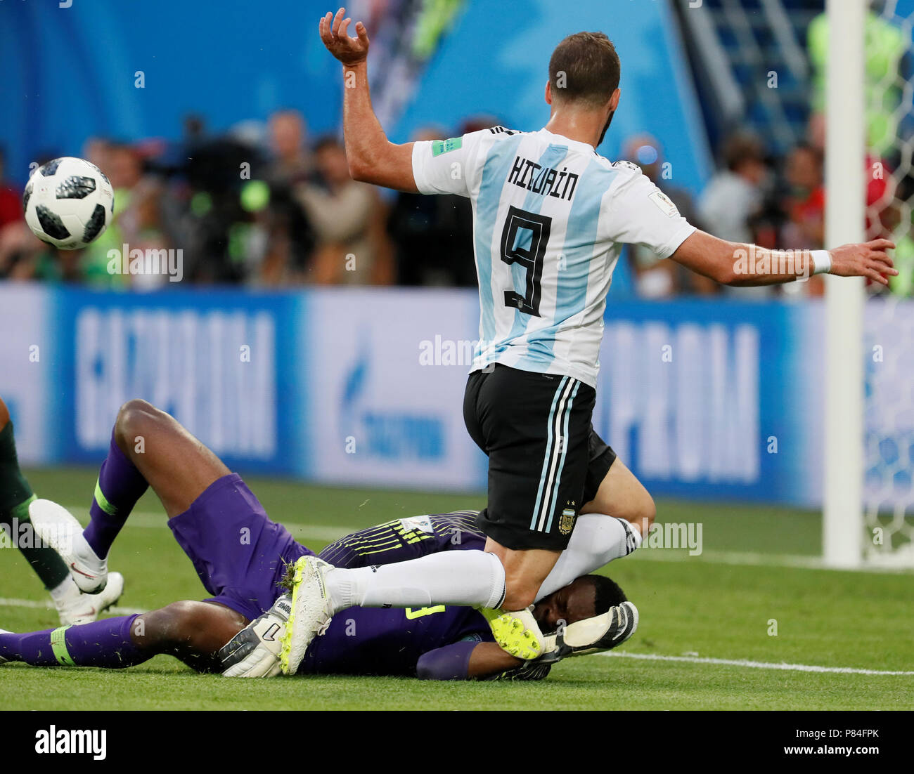 SAINT PETERSBURG, RUSSIA - JUNE 26: Francis Uzoho of Nigeria national team and Gonzalo Higuain of Argentina national team collide during the 2018 FIFA World Cup Russia group D match between Nigeria and Argentina at Saint Petersburg Stadium on June 26, 2018 in Saint Petersburg, Russia. (MB Media) Stock Photo
