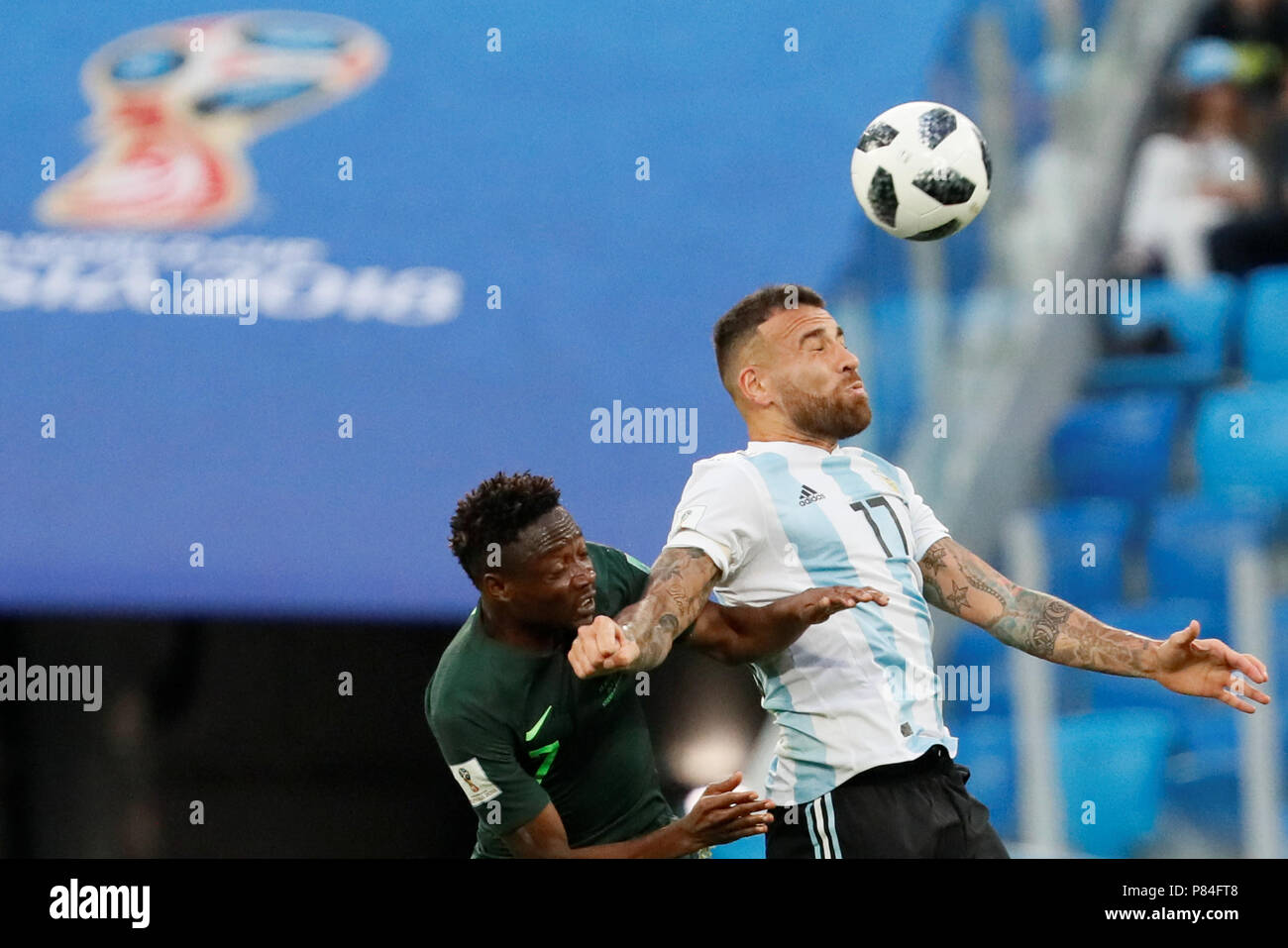 SAINT PETERSBURG, RUSSIA - JUNE 26: Ahmed Musa (L) of Nigeria national team and Nicolas Otamendi of Argentina national team vie for a header during the 2018 FIFA World Cup Russia group D match between Nigeria and Argentina at Saint Petersburg Stadium on June 26, 2018 in Saint Petersburg, Russia. (MB Media) Stock Photo