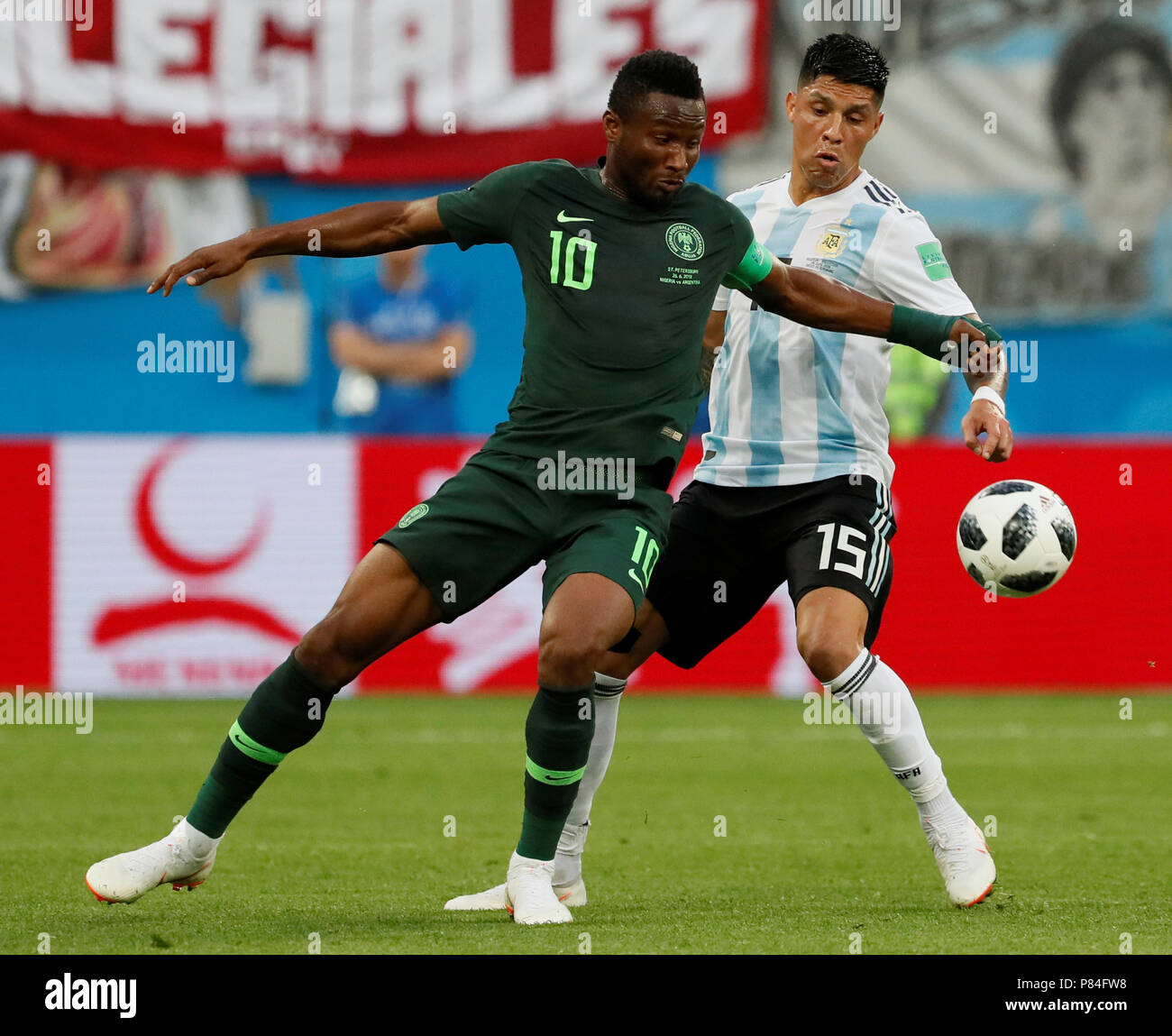 SAINT PETERSBURG, RUSSIA - JUNE 26: John Obi Mikel (L) of Nigeria national team and Enzo Perez of Argentina national team vie for the ball during the 2018 FIFA World Cup Russia group D match between Nigeria and Argentina at Saint Petersburg Stadium on June 26, 2018 in Saint Petersburg, Russia. (MB Media) Stock Photo