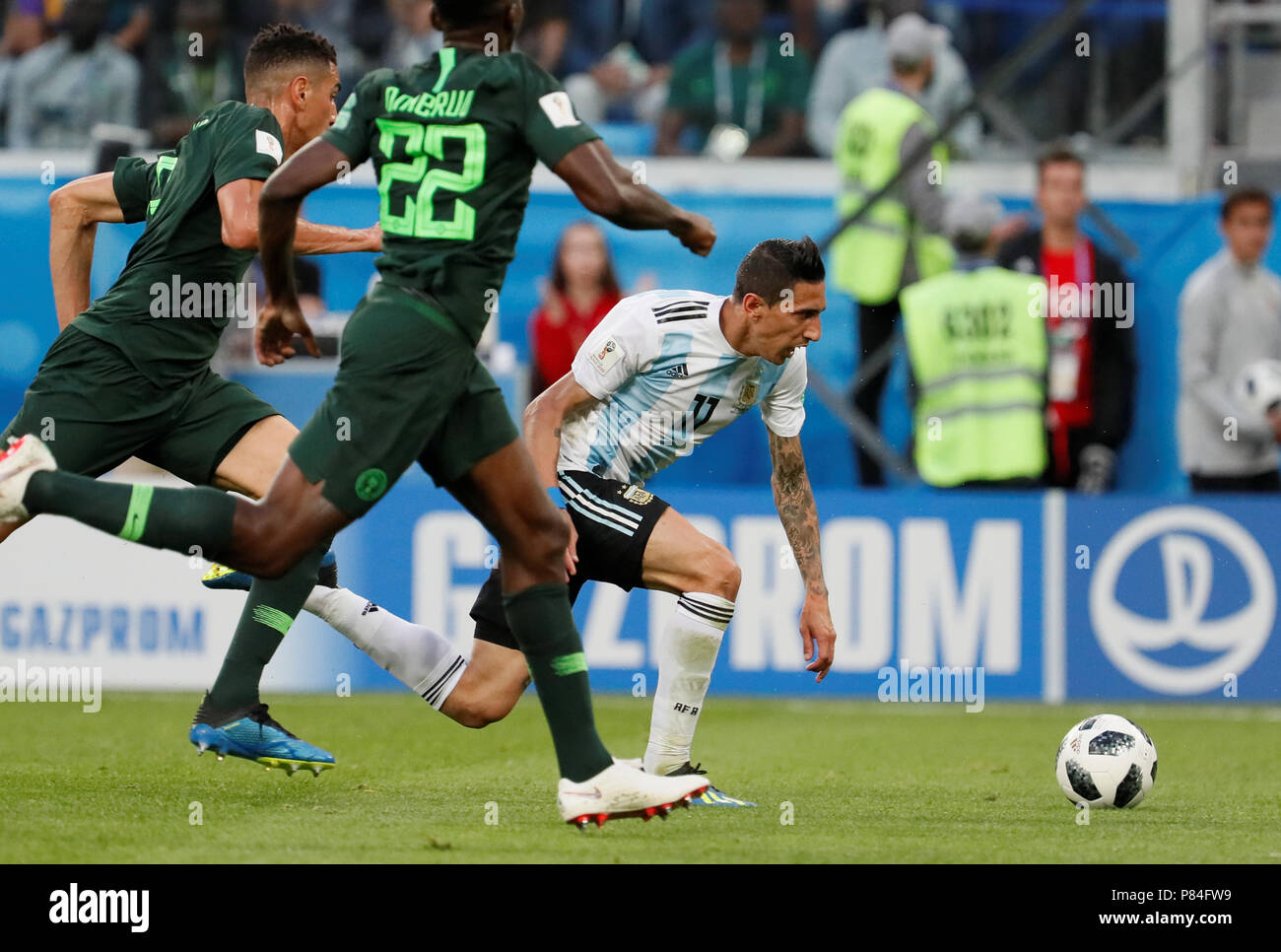 SAINT PETERSBURG, RUSSIA - JUNE 26: Angel Di Maria (R) of Argentina national team vies for the ball with Leon Balogun (L) and Kenneth Omeruo of Nigeria national team during the 2018 FIFA World Cup Russia group D match between Nigeria and Argentina at Saint Petersburg Stadium on June 26, 2018 in Saint Petersburg, Russia. (MB Media) Stock Photo