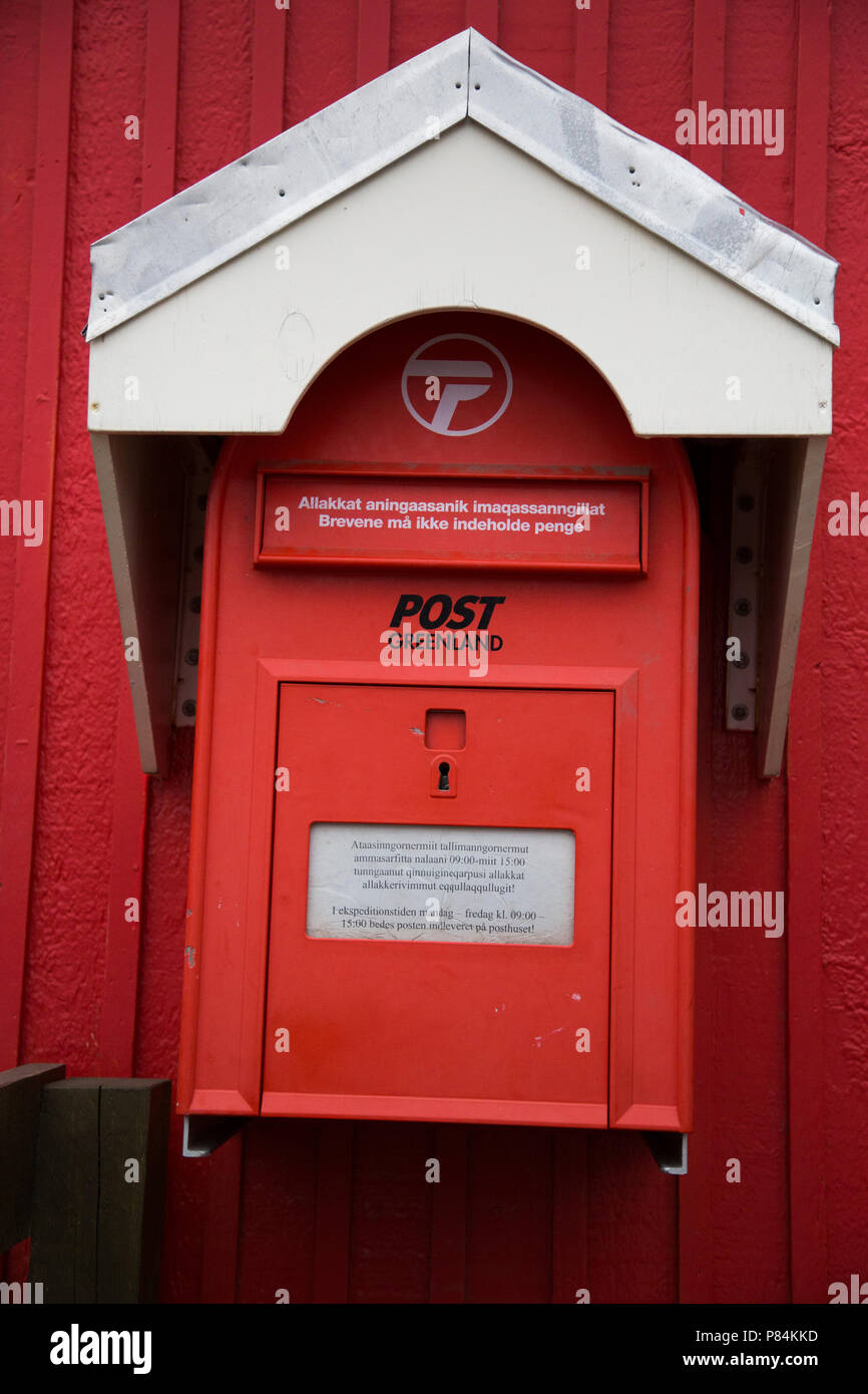 Red postbox for the Greenland Postal service, Taliisaq, Eastern Greenland Stock Photo