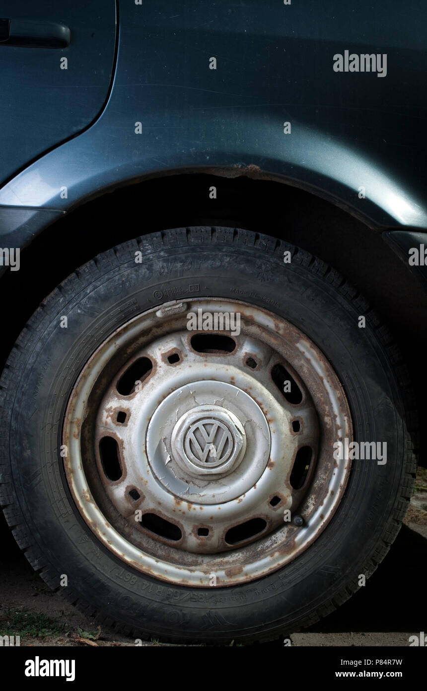 Corroded wheel on a second hand car Stock Photo