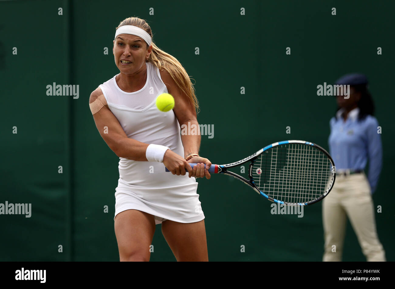 Dominika Cibulkova in action on day seven of the Wimbledon Championships at the All England Lawn Tennis and Croquet Club, Wimbledon. PRESS ASSOCIATION Photo. Picture date: Monday July 9, 2018. See PA story TENNIS Wimbledon. Photo credit should read: Jonathan Brady/PA Wire. Stock Photo