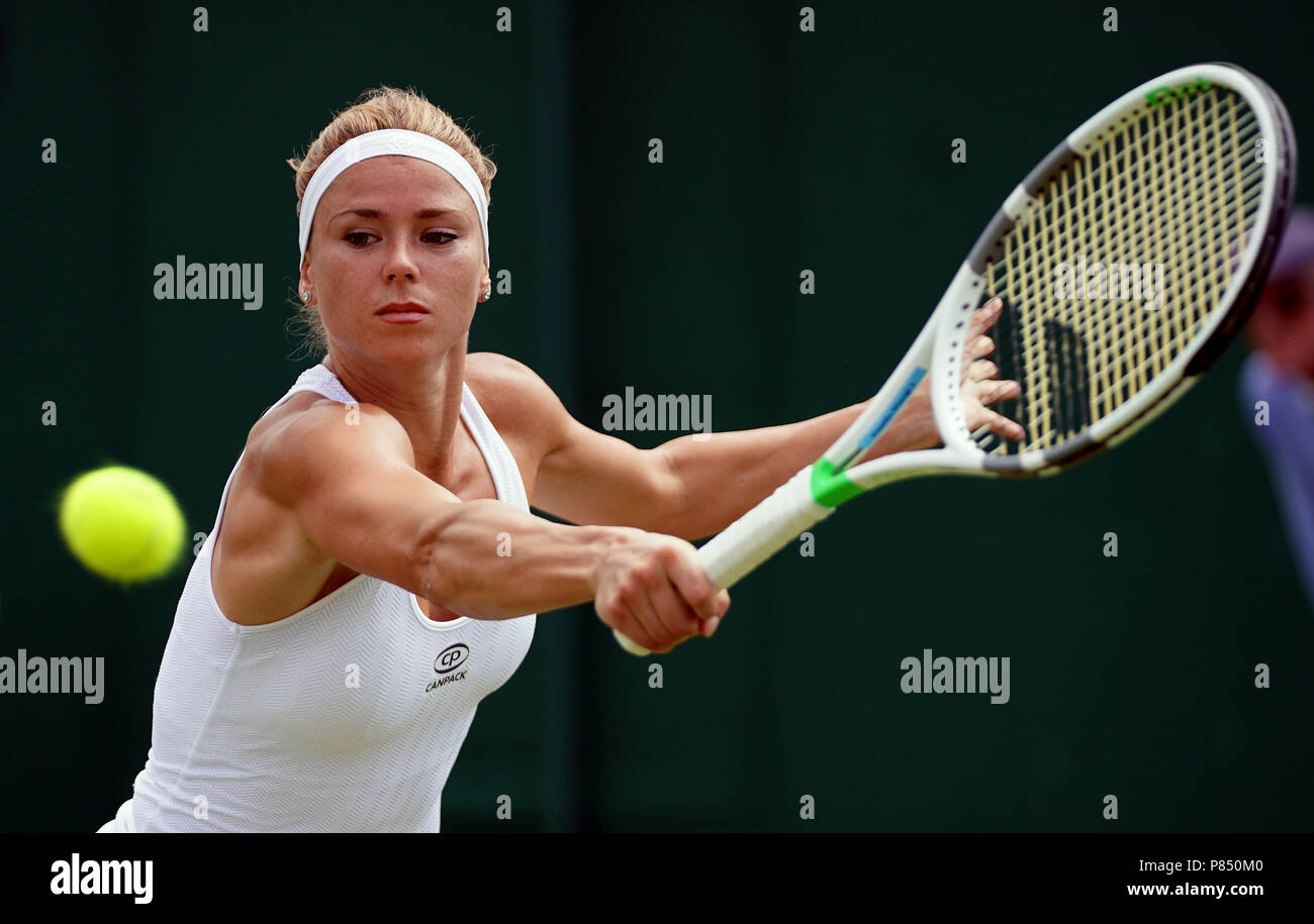 Camila Giorgi in action on day seven of the Wimbledon Championships at the All England Lawn Tennis and Croquet Club, Wimbledon. Stock Photo
