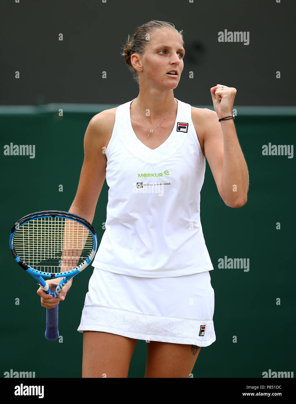 Karolina Pliskova reacts on day seven of the Wimbledon Championships at the All England Lawn Tennis and Croquet Club, Wimbledon. Stock Photo