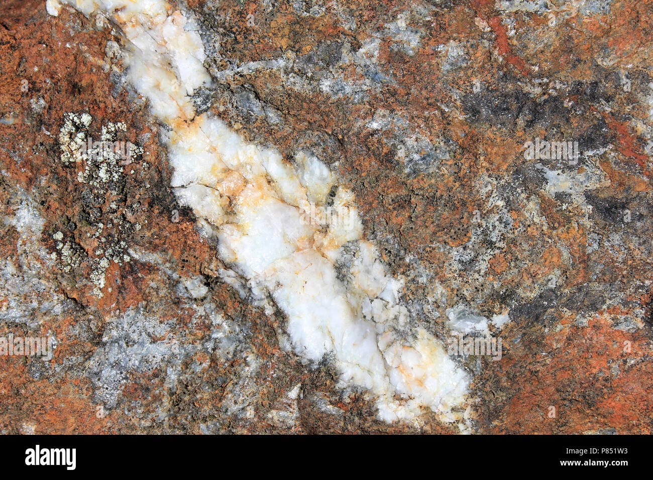 Volcanogenic Massive Sulfide (VMS) Ore (Copper, Zinc, Lead) Deposit with non-ore Quartz Vein from Parys Mountain, Anglesey Stock Photo