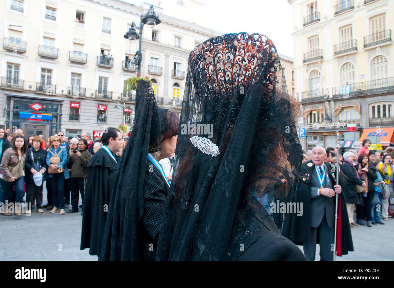 Women wearing Spanish mantilla during a Holy Week procession. Madrid, Spain. Stock Photo