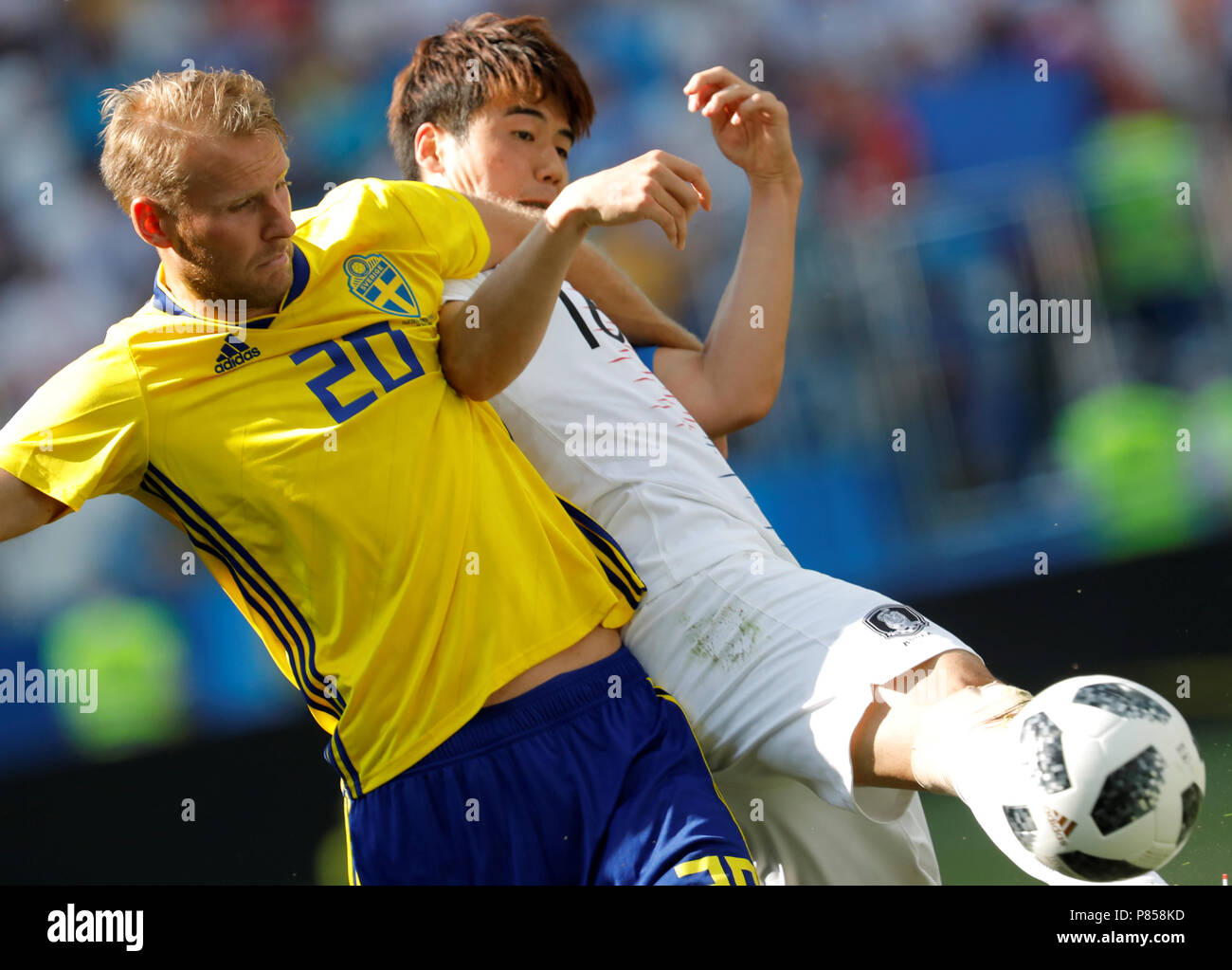 NIZHNY NOVGOROD, RUSSIA - JUNE 18: Ola Toivonen (L) of Sweden national team and Sungyueng Ki of Korea Republic national team vie for the ball during the 2018 FIFA World Cup Russia group F match between Sweden and Korea Republic at Nizhny Novgorod Stadium on June 18, 2018 in Nizhny Novgorod, Russia. Stock Photo