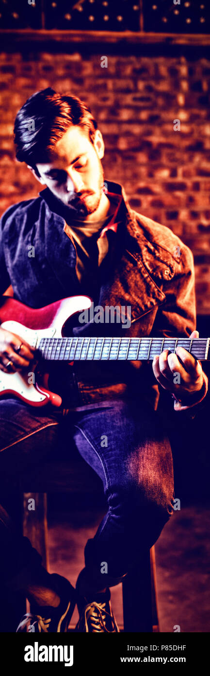 hipster, nightclub, bar, pub, counter, professional, skill, expertise, casual clothing, guitar, elec Stock Photo