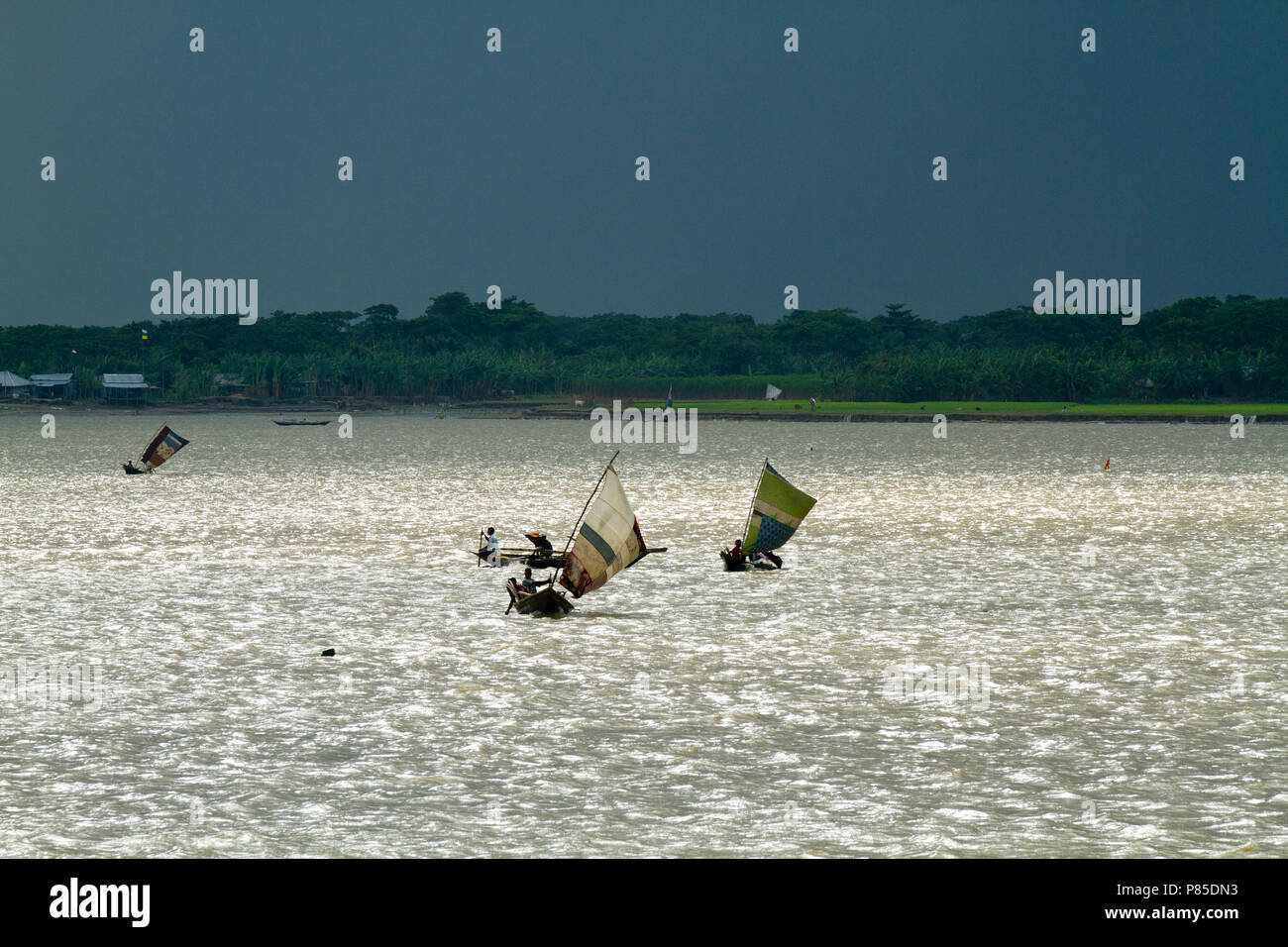 Sail boats on the Kirtonkhola River in Barisal. Bangladesh. Stock Photo