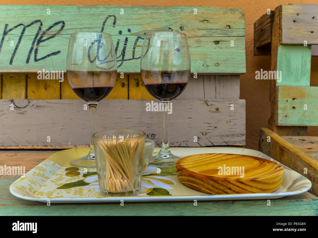 Two glasses of wine on a tray outside a restaurant - Ponferrada - Leon - Spain Stock Photo