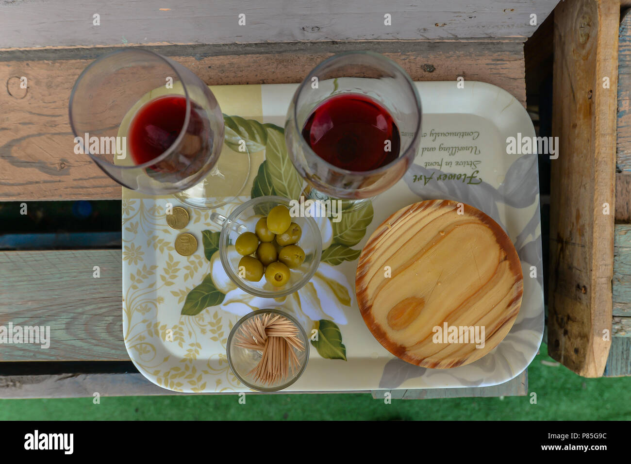 Two glasses of wine on a tray outside a restaurant - Ponferrada - Leon - Spain Stock Photo