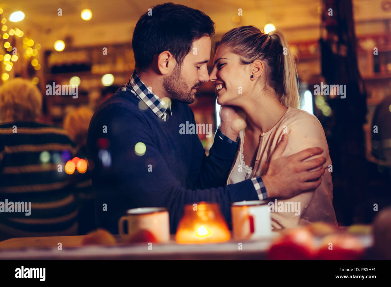 Young couple kissing at night hi-res stock photography and images - Alamy