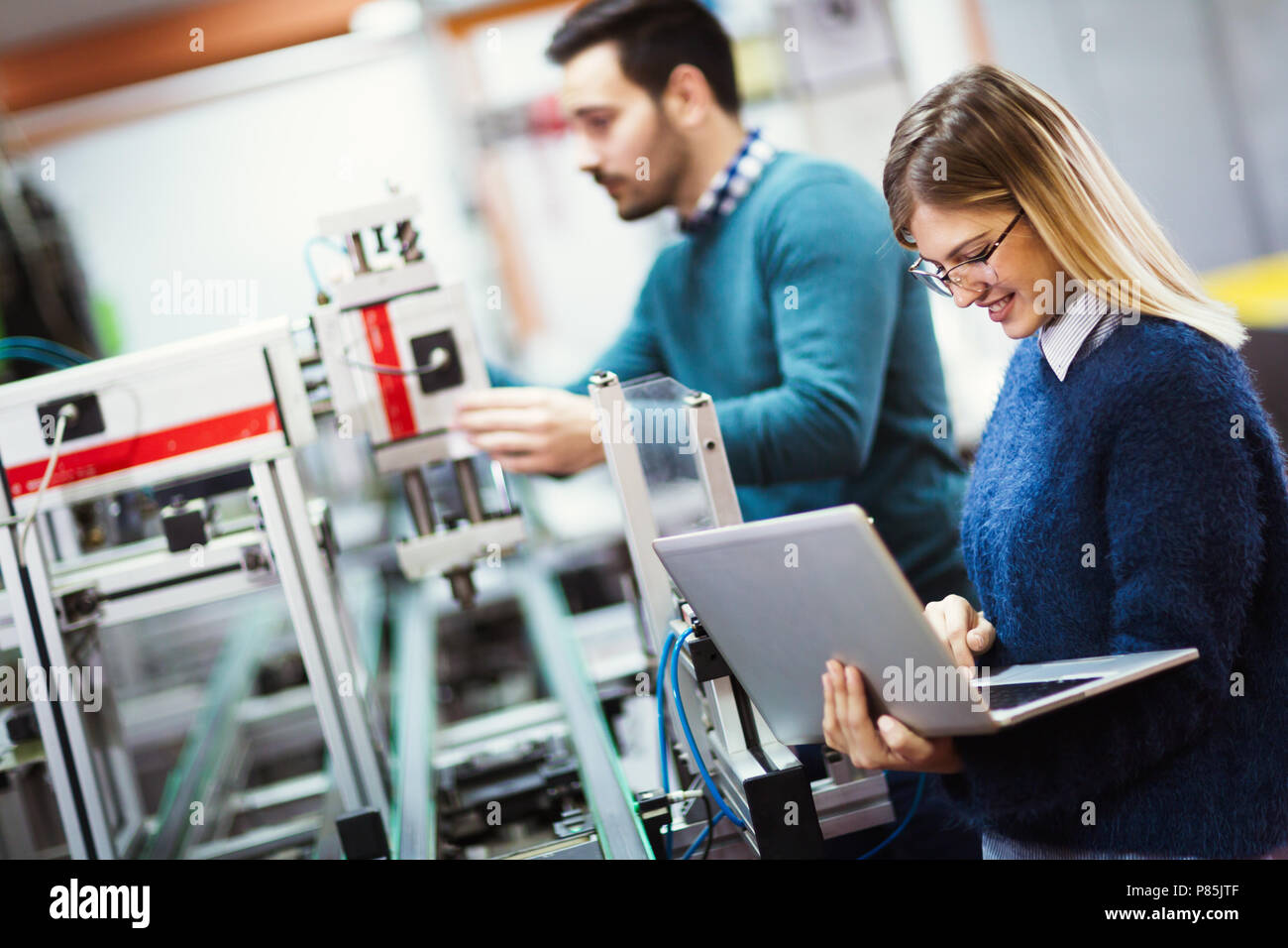 Young students of electronics working on project Stock Photo