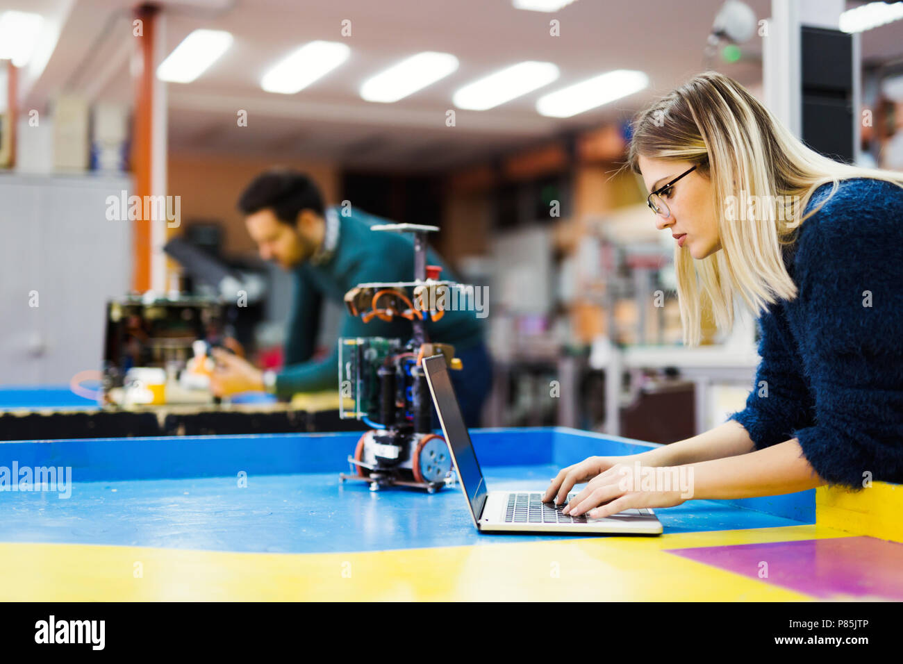 Young student of robotics working on project Stock Photo