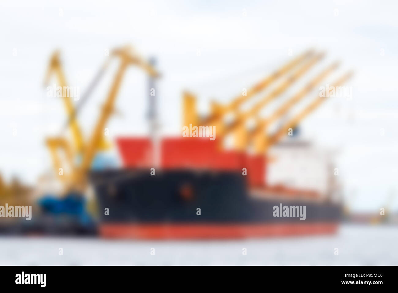 Cargo ship - soft lens bokeh image. Defocused background Stock Photo