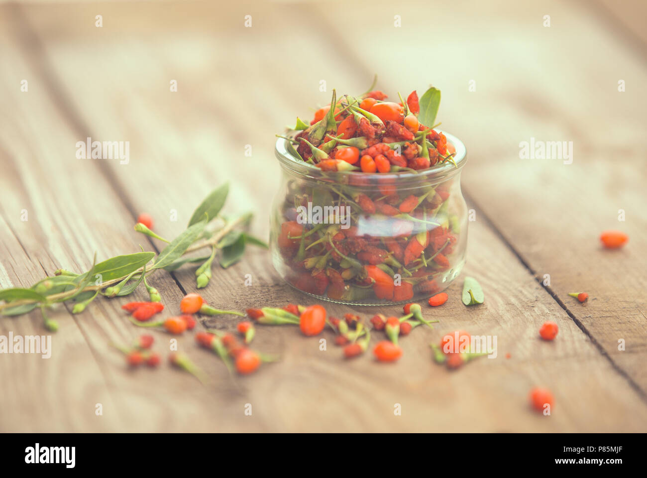 Goji berries on a wooden background Stock Photo