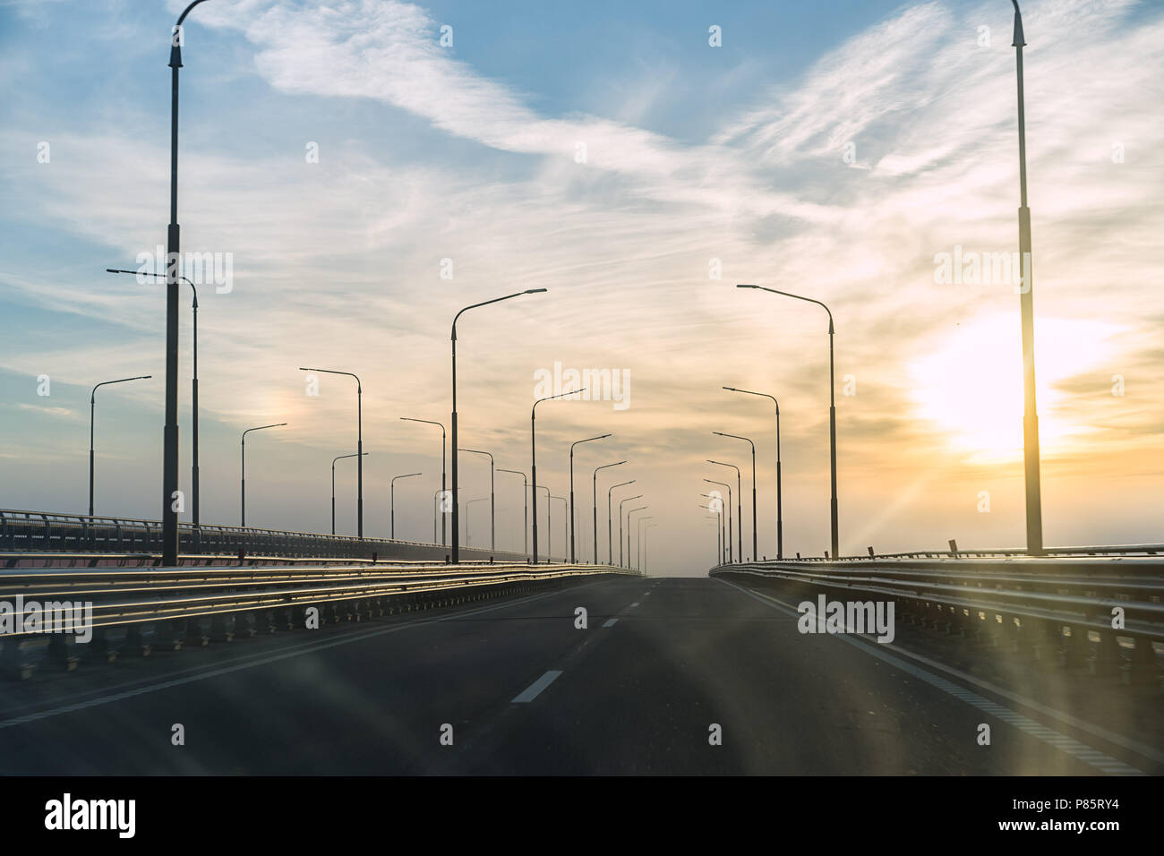 Empty road sunrise hi-res stock photography and images - Alamy
