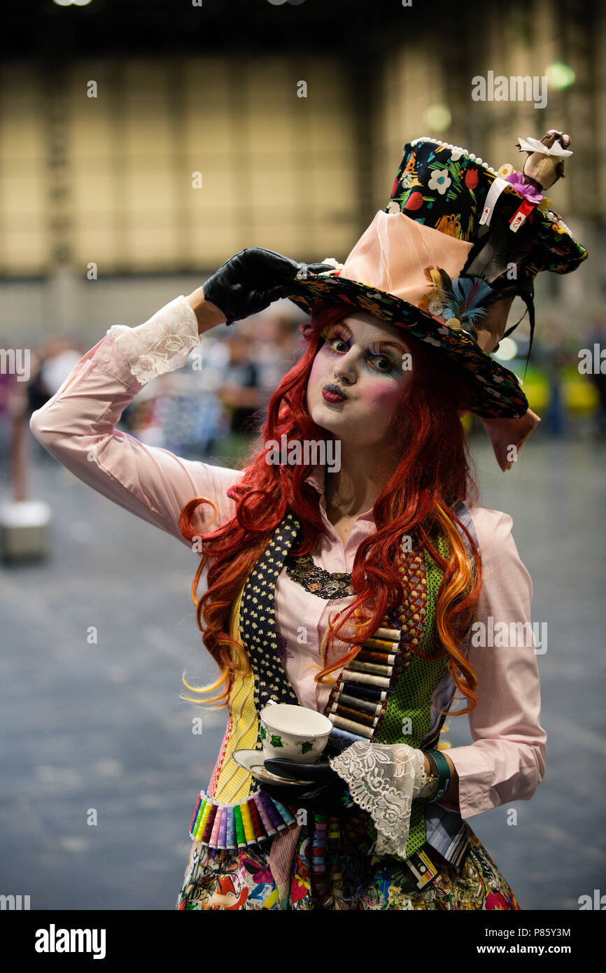 NEC, Brirmingham, UK - June 2, 2018. A girl cosplayer dressed as the Mad Hatter tea party from Alice In Wonderland at a  Collectormania comic con Stock Photo