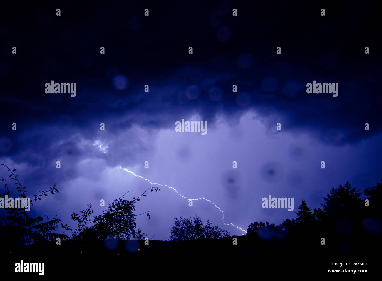Onweer en bliksem Ardennen, Thunderstorm and lightning Ardennes Stock Photo