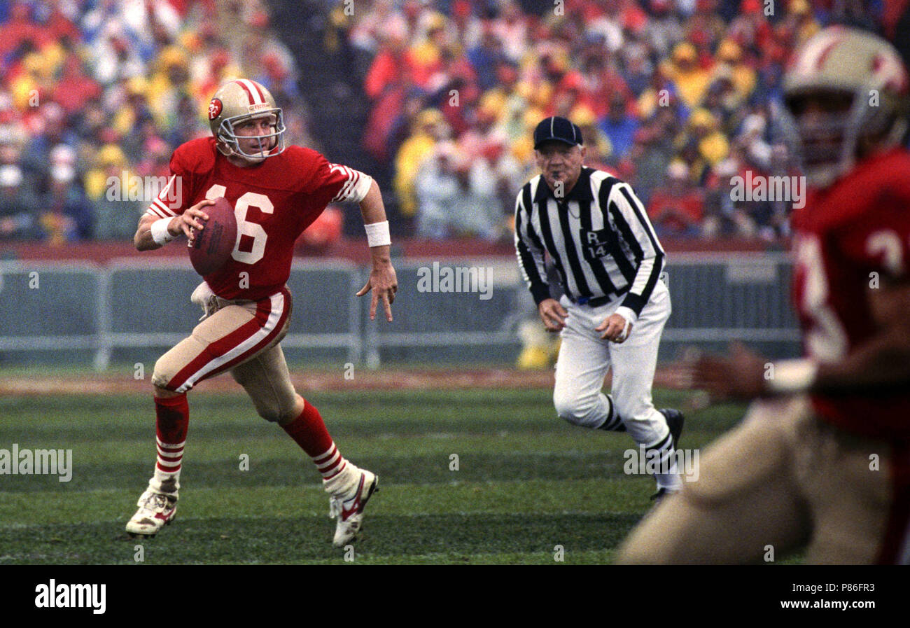 Quarterback Joe Montana #16 of the San Francisco 49ers rolls out to  pass.Circa the 1980's. (Icon Sportswire via AP Images Stock Photo - Alamy