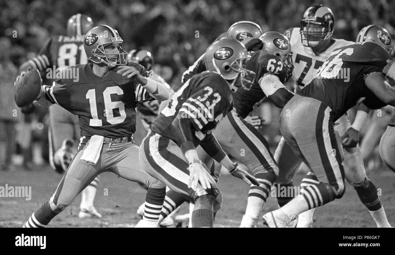 December 19, 1986 - San Francisco, California, U.S - San Francisco 49ers vs. Los Angles Rams at Candlestick Park Friday, December 19, 1986. 49ers Beat Rams 24-14. San Francisco Quarterback Joe Montana (16) passing. (Credit Image: © Al Golub via ZUMA Wire) Stock Photo