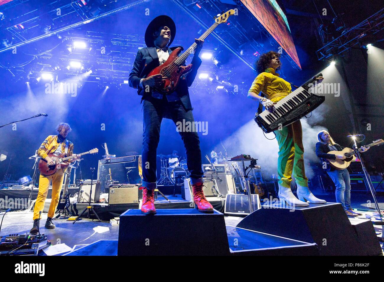 Milwaukee, Wisconsin, USA. 8th July, 2018. RICHARD REED PARRY, WIN BUTLER, REGINE CHASSAGNE and TIM KINGSBURY of Arcade Fire during Summerfest Music Festival at Henry Maier Festival Park in Milwaukee, Wisconsin Credit: Daniel DeSlover/ZUMA Wire/Alamy Live News Stock Photo