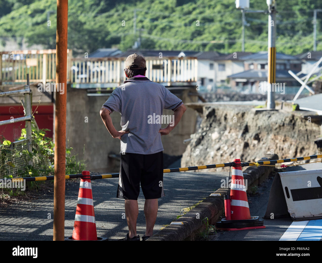 July 9, 2018, Nomura, Ehime Prefecture: The aftermath of the flood from Hijikawa river. In Seiyo City, Ehime Prefecture, the Hijikawa River flooded, leaving three men and two women dead. Local residents survey the damage and work out what to do next. (Photo by Tomohiro Takahashi/AFLO) Stock Photo