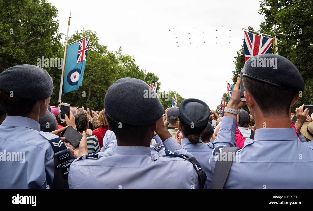 London, UK. 10th July, 2018. Air Training Corps cadets watch the flypast on the Mall, in London of the RAF 100 Flypast on July 10, 2018. Photo by David Levenson Credit: David Levenson/Alamy Live News Stock Photo