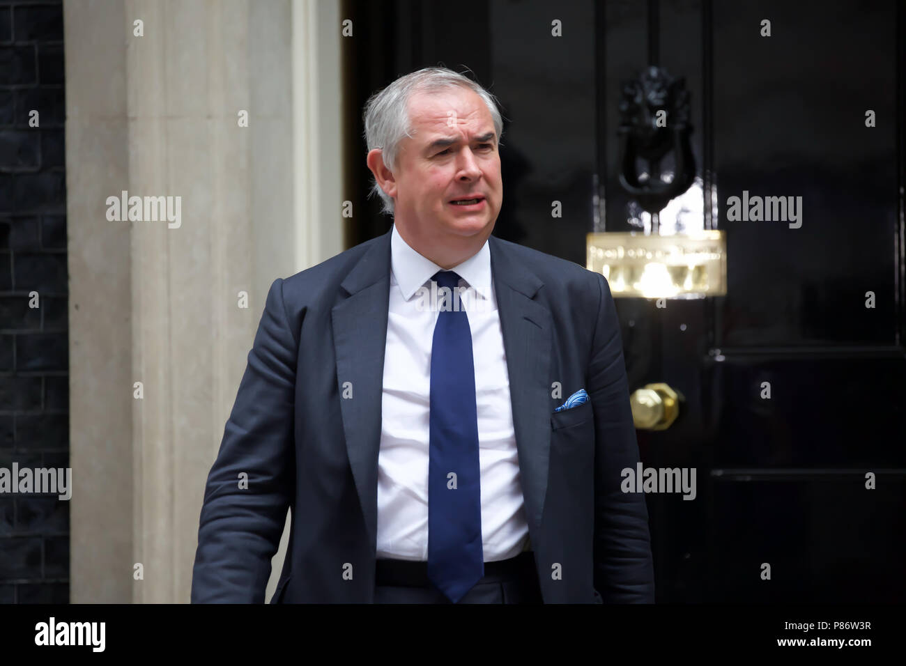 London,UK,10th July 2018,Attorney General Geoffrey Cox QC MP leaves after the weekly cabinet meeting after yesterday’s shock resignations of David Davis and Boris Johnson at 10 Downing Street in London.Credit Keith Larby/Alamy Live News Stock Photo