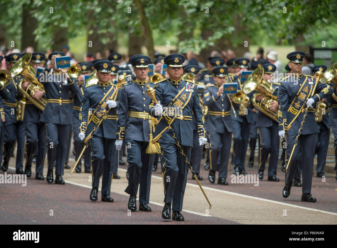 Birdcage Walk, London, UK. 10 July, 2018. Celebrations to mark the Centenary of the Royal Air Force take place in London with the Central Band and Escort of the RAF marching to Horse Guards Parade. Credit: Malcolm Park/Alamy Live News. Stock Photo