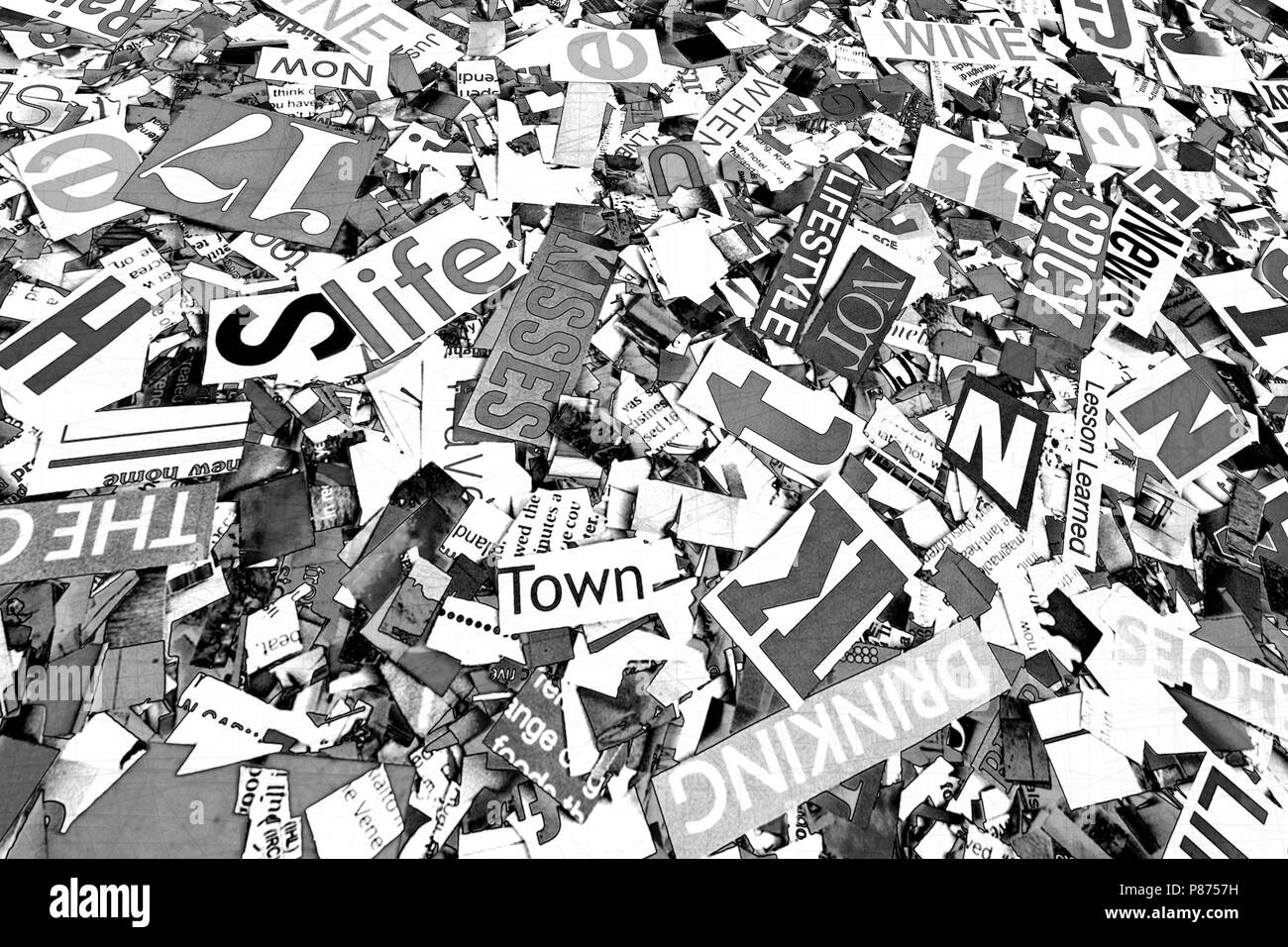 a random pile on words and letters in toned monochrome close up Stock Photo