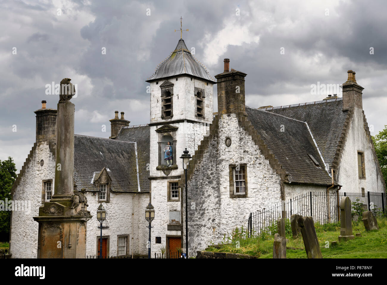 17th Century Burgh architecture of Cowanes Hospital with statue of John Cowane at Holy Rude Old Town cemetery on Castle Hill of Stirling Scotland Stock Photo