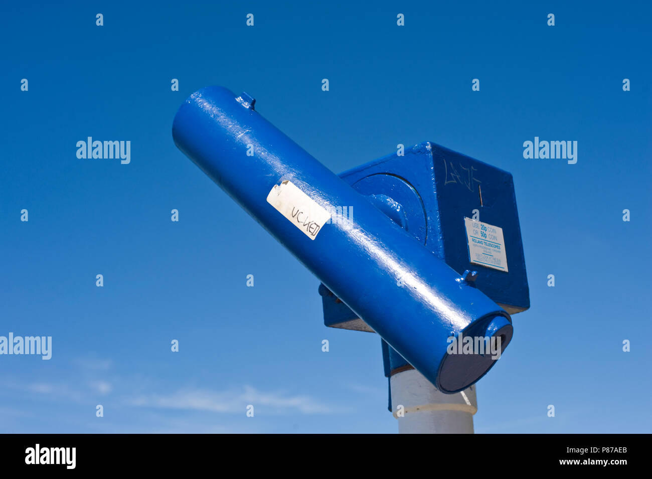 Blue tourist telescope against a blue sky on Plymouth Hoe in Plymouth Devon England UK Stock Photo