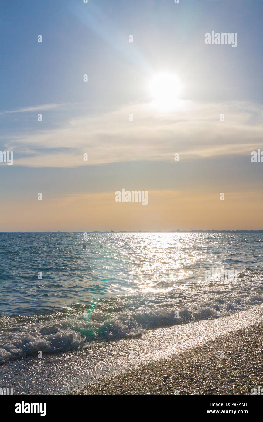 Beautiful summer sunset with clouds over the sea Stock Photo - Alamy