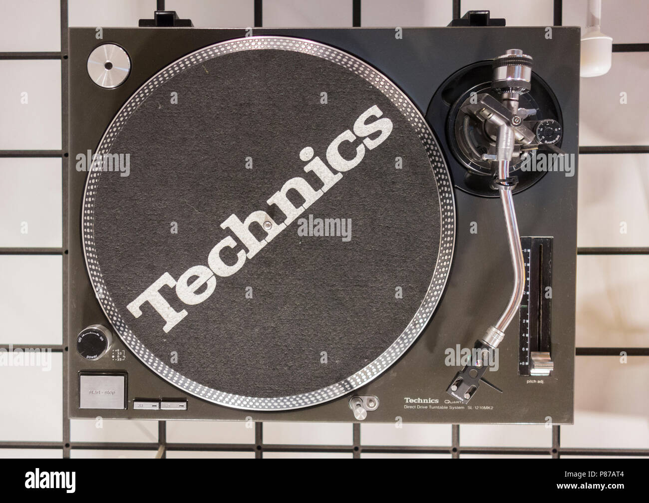 A Technics 1210 series turntable on display at a London museum Stock Photo