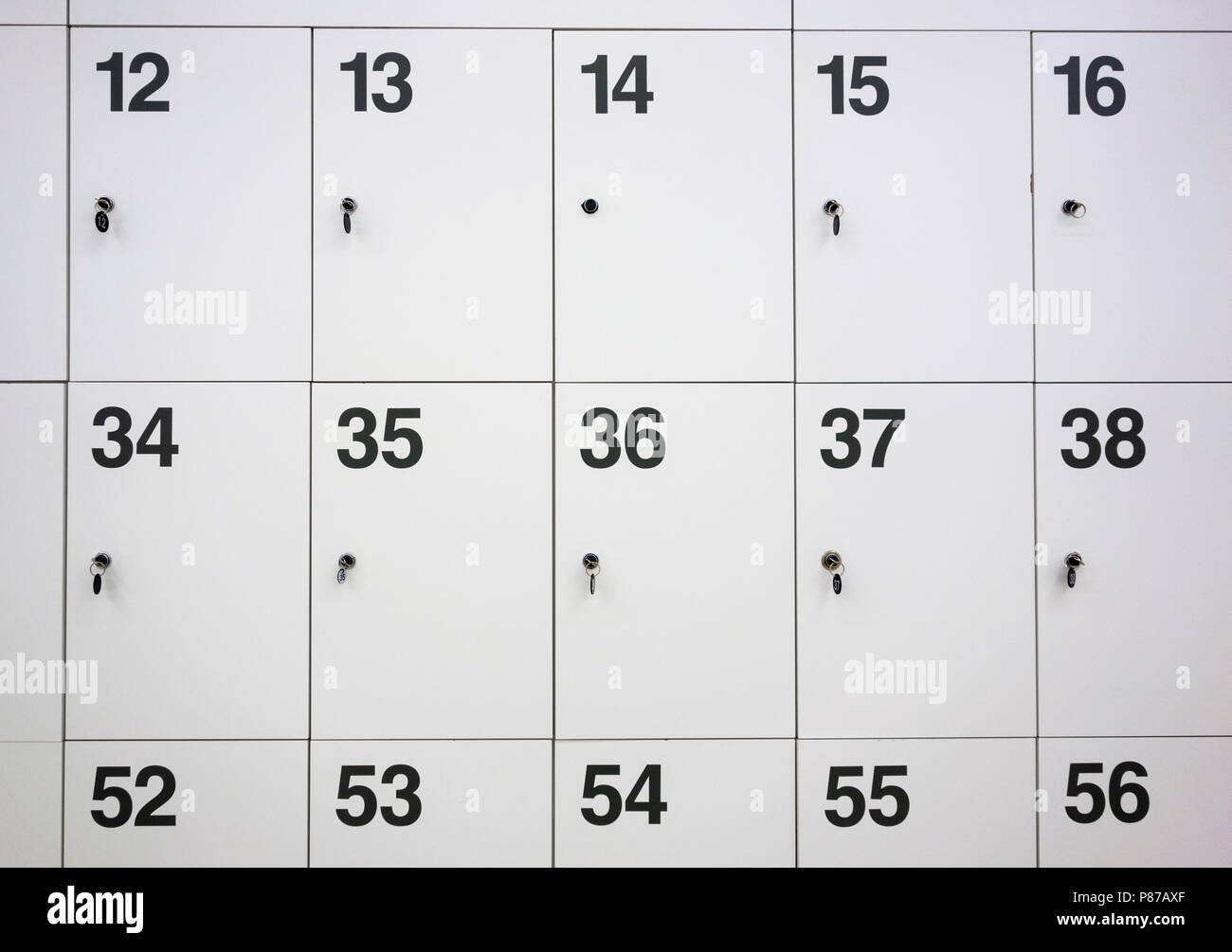 Locker room numbers in a locker room Stock Photo