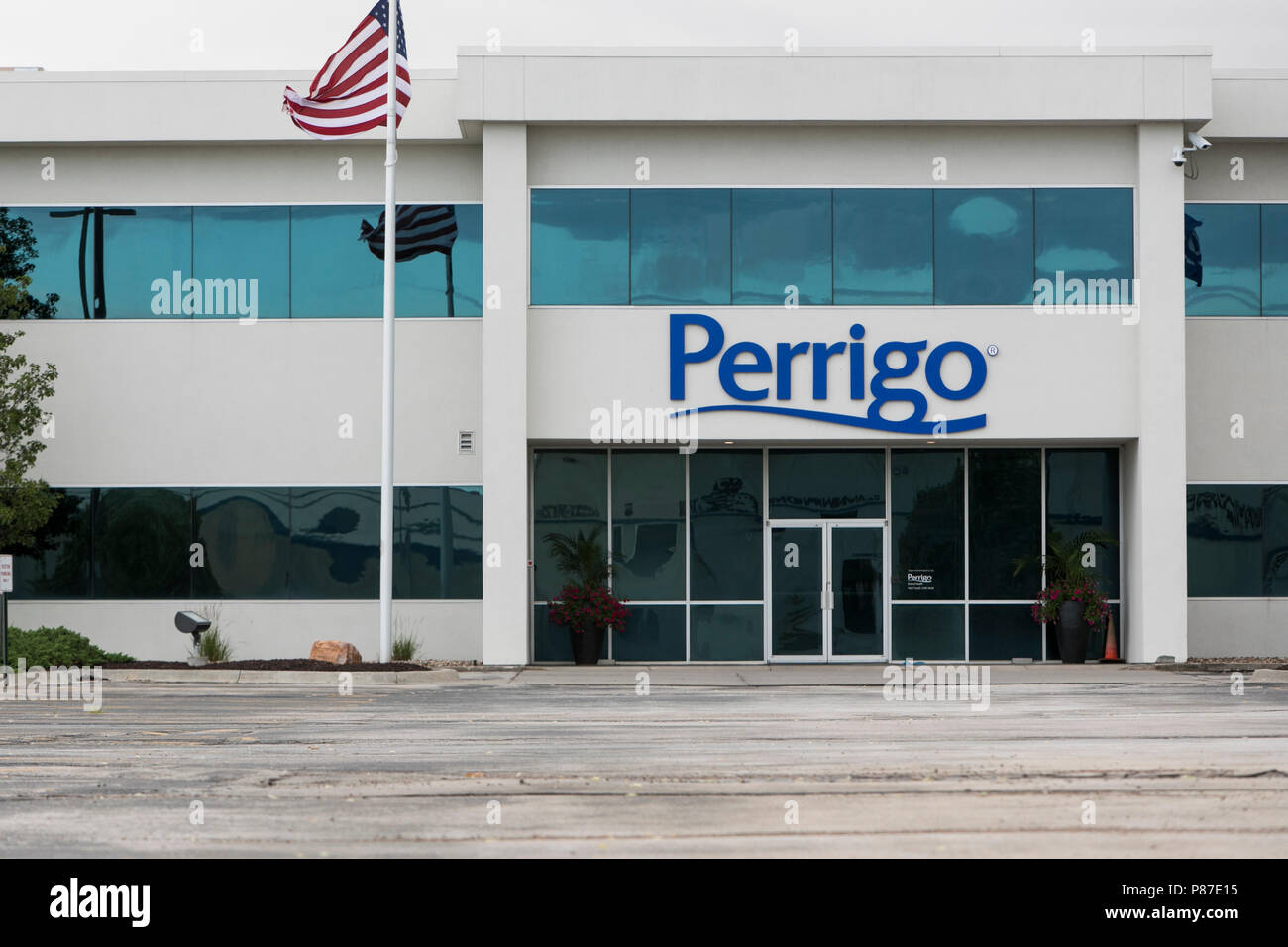 Perrigo Building A logo sign outside of a facility occupied by the Perrigo Company in ...
