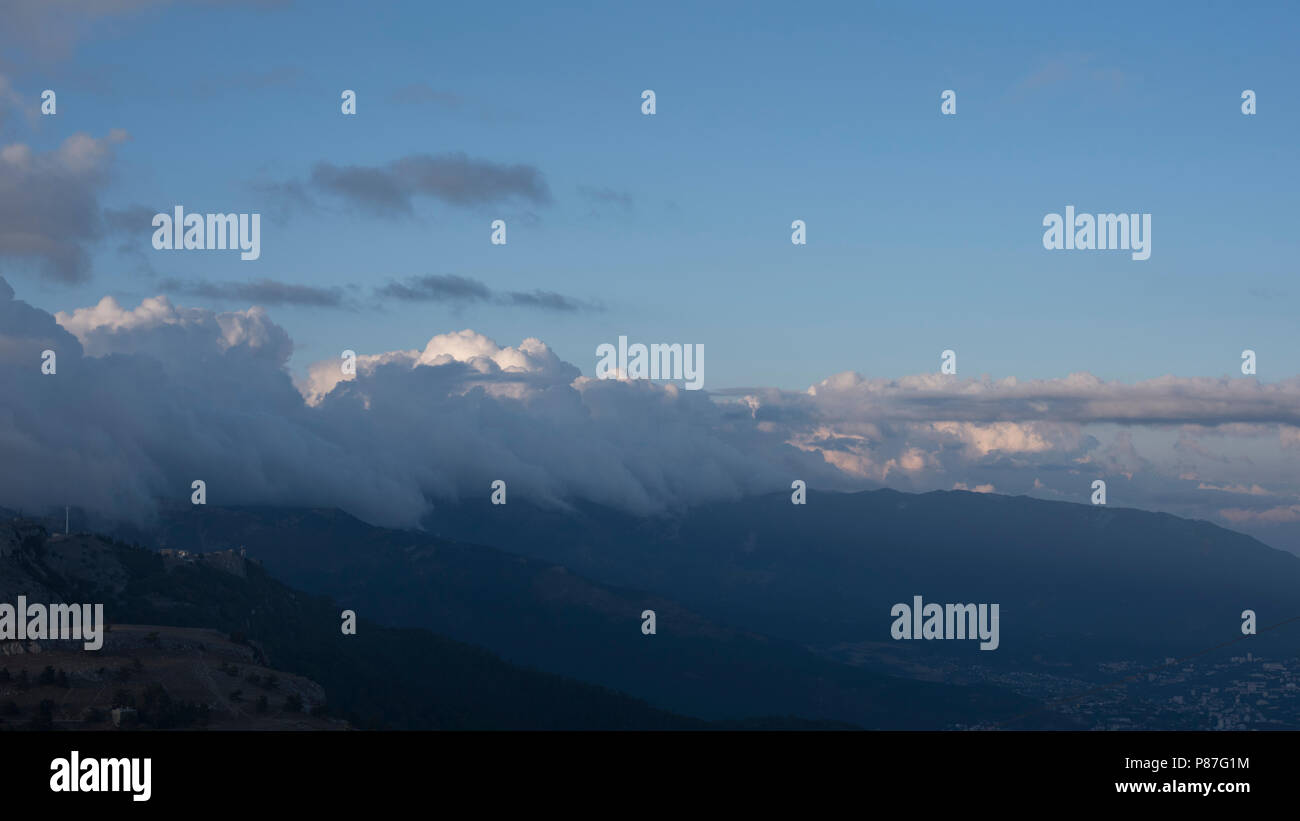 mountains with clouds and valley Stock Photo - Alamy