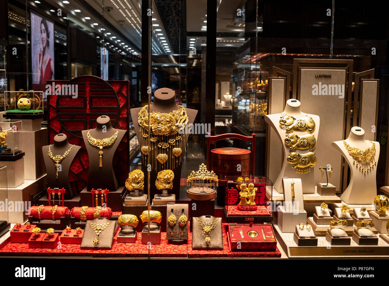 Luk Fook jewellery gold product window display in Hong Kong Stock