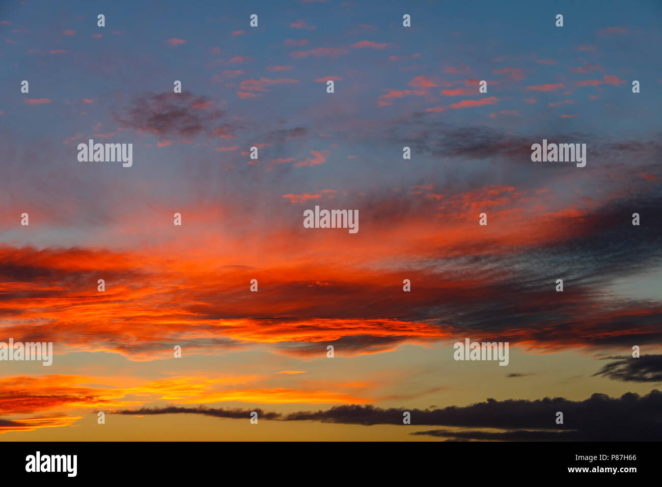 The sun lighting up the cloudcover Stock Photo Alamy