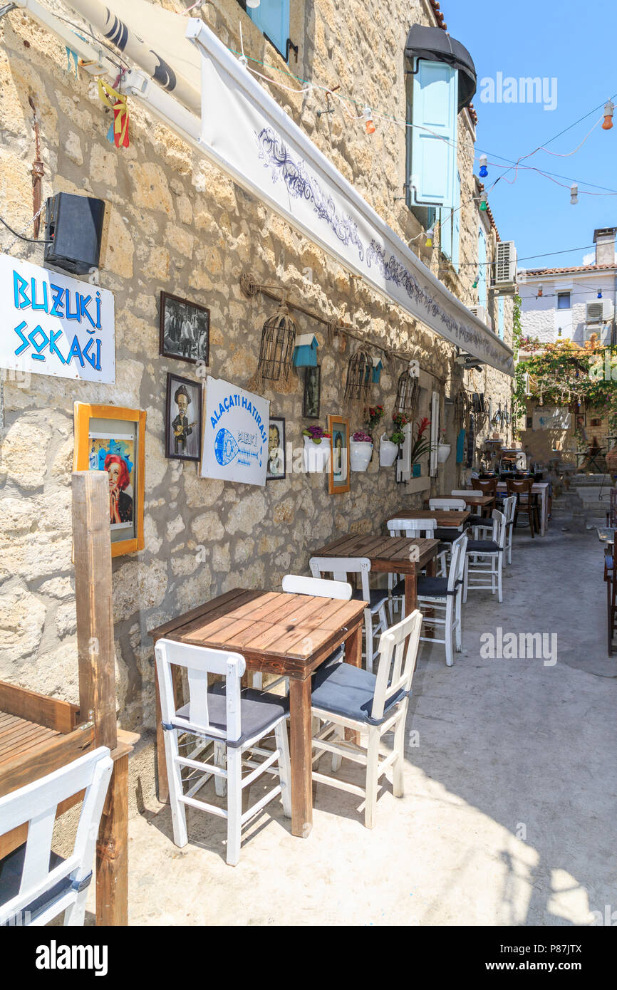 Retro Street of Alacati with tables in Cesme, Turkey Stock Photo