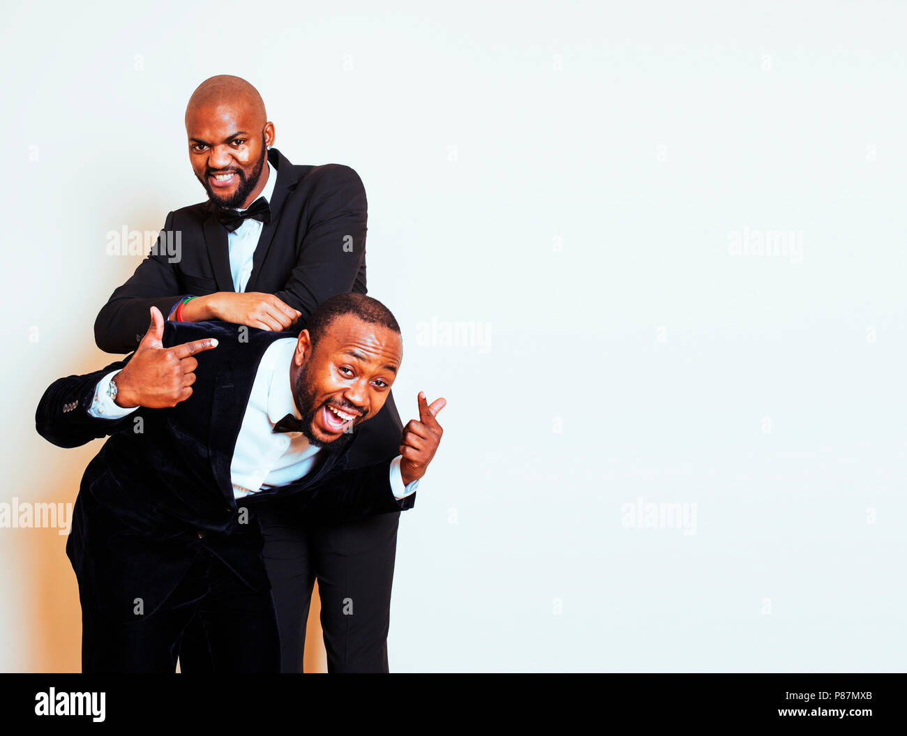 two afro-american businessmen in black suits emotional posing, g Stock ...