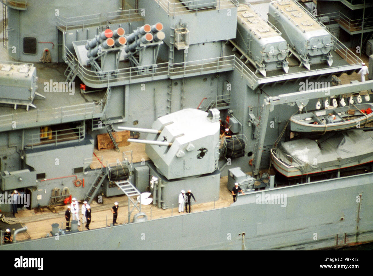 5inch 38caliber. The 5inch .38caliber dual gun mount on the starboard side of the USS NEW
