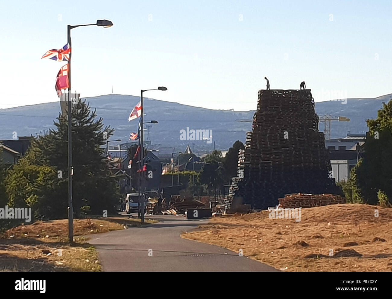 Bloomfield Walkway bonfire in east Belfast on Monday evening after Belfast City Council asked bonfire builders to reduce its size. Stock Photo