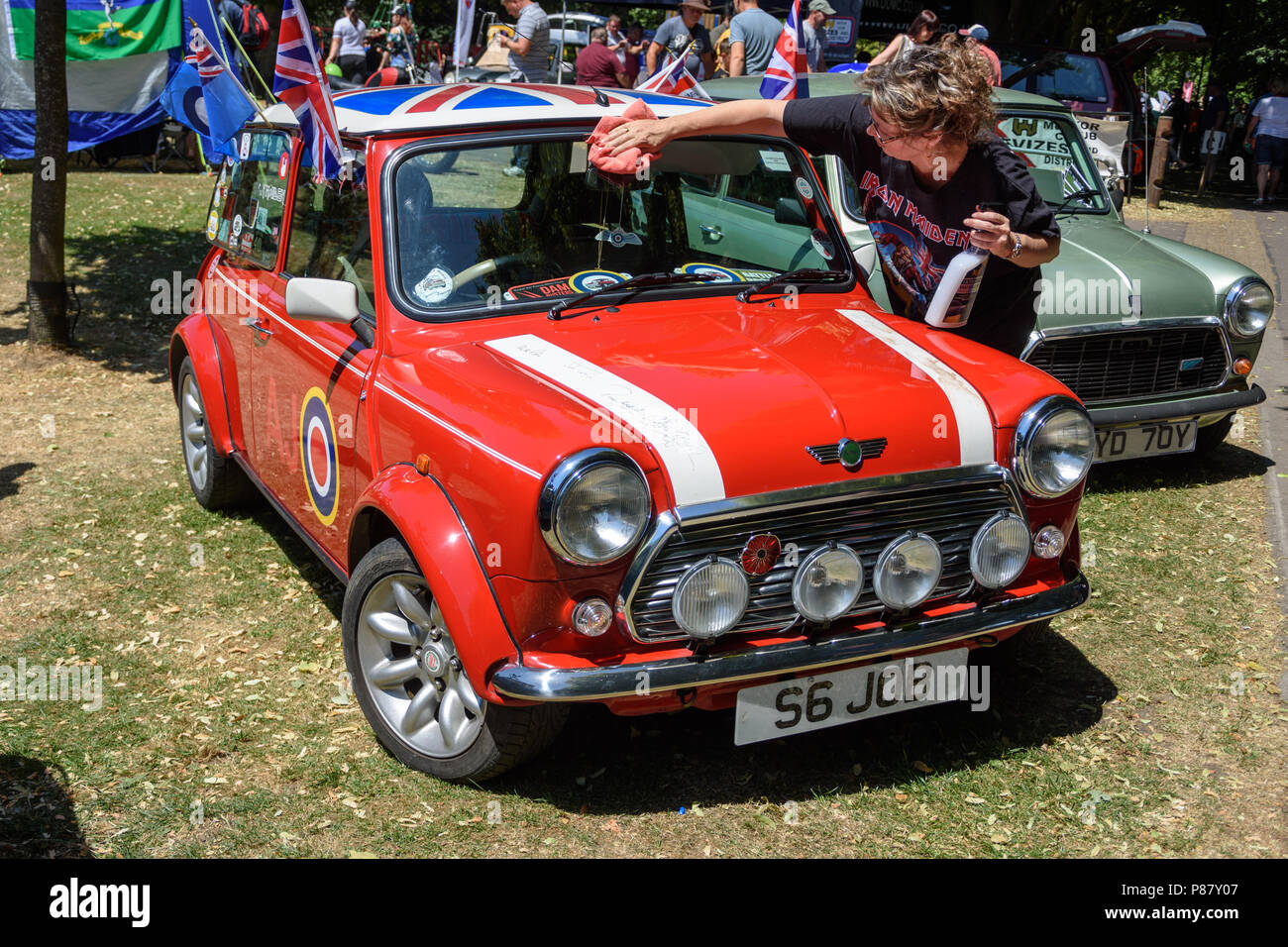 A Red Mini Cooper wth a Union Jack Roof by John Cooper version of